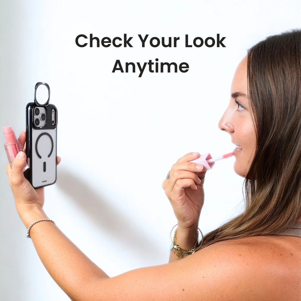 Woman applying lipstick while holding a mirror case, with text 'Check Your Look Anytime'.