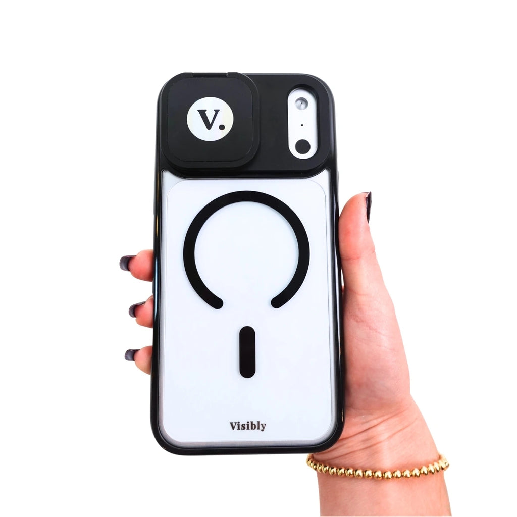 Mirror phone case with the flip-open mirror closed, held by a hand on a white background